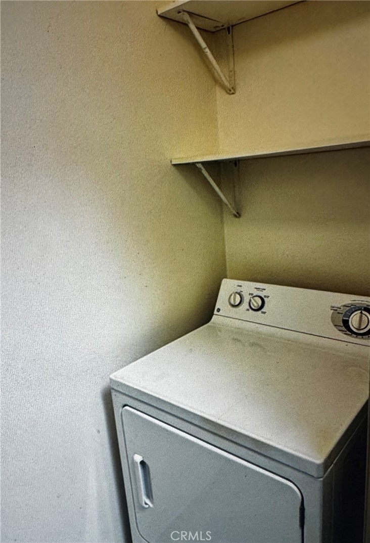 488 East Ocean Boulevard, Unit 418 Long Beach, CA 90802 - Photo 19 of 29 a utility room with dryer and washer