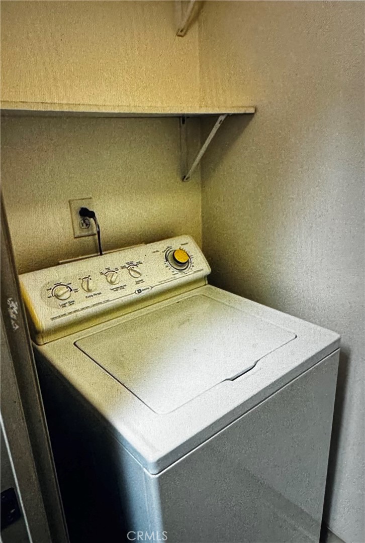 488 East Ocean Boulevard, Unit 418 Long Beach, CA 90802 - Photo 20 of 29 a utility room with dryer and washer