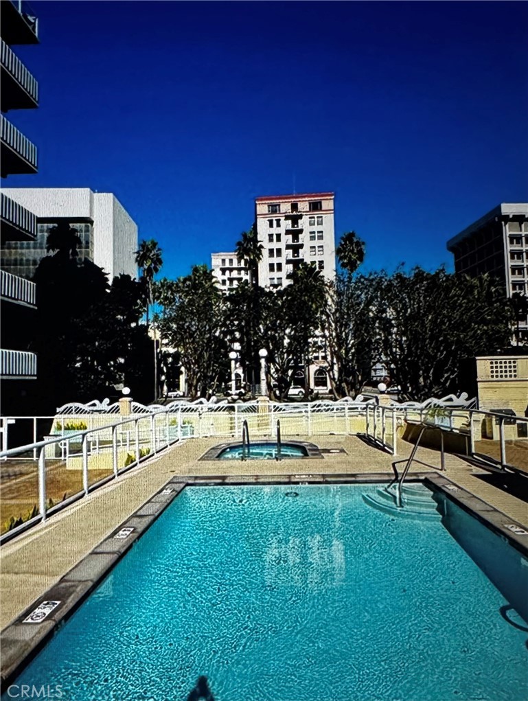 488 East Ocean Boulevard, Unit 418 Long Beach, CA 90802 - Photo 24 of 29 a swimming pool with outdoor seating and yard