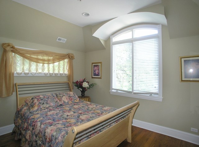 611 Greendale Road Glenview, IL 60025 - Photo 16 of 25 a bed sitting in a bedroom next to a window
