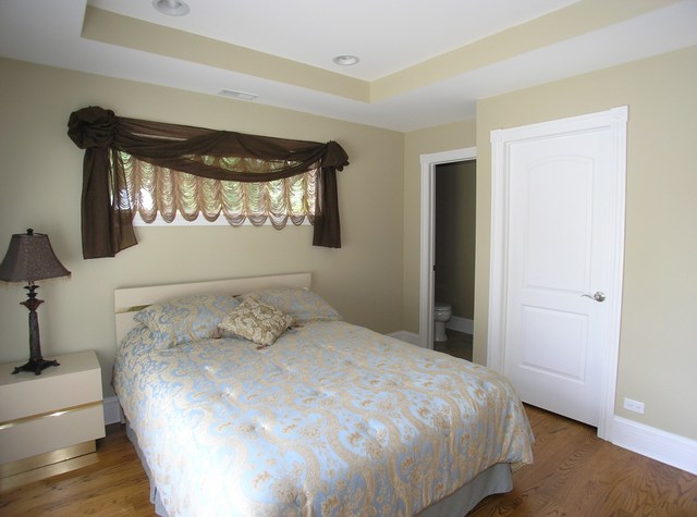 611 Greendale Road Glenview, IL 60025 - Photo 17 of 25 a bedroom with a bed and window