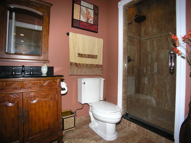 611 Greendale Road Glenview, IL 60025 - Photo 22 of 25 a bathroom with a toilet a sink and shower