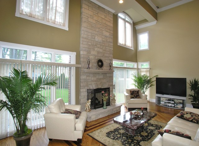611 Greendale Road Glenview, IL 60025 - Photo 7 of 25 a living room with furniture a fireplace and a flat screen tv