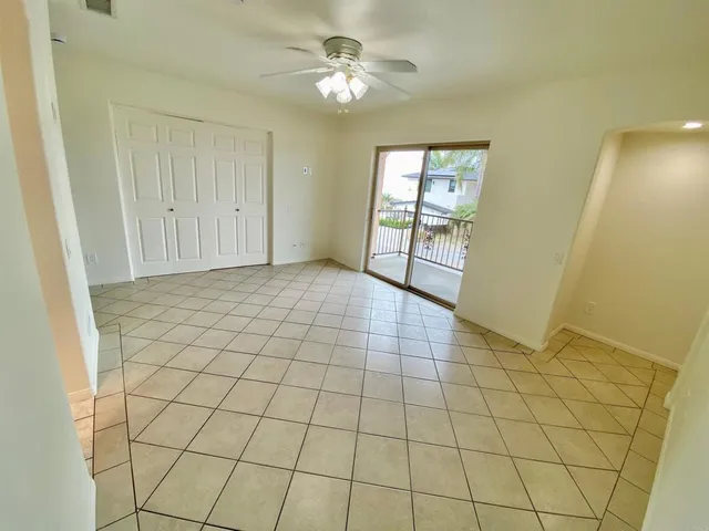 a view of balcony with furniture