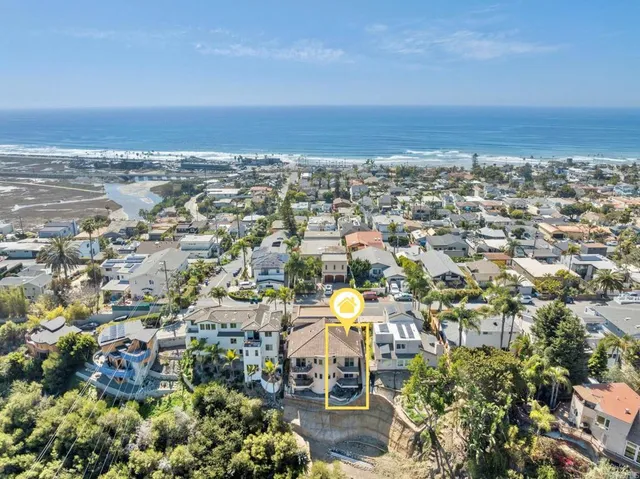 an aerial view of multiple house