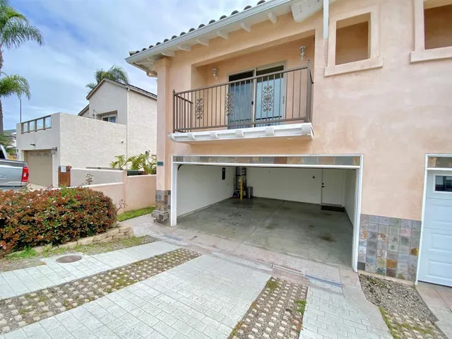 a view of a house with a table and chair