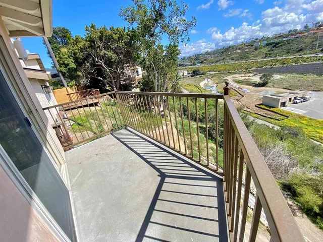 a kitchen with stainless steel appliances granite countertop a refrigerator a stove a sink and a sink