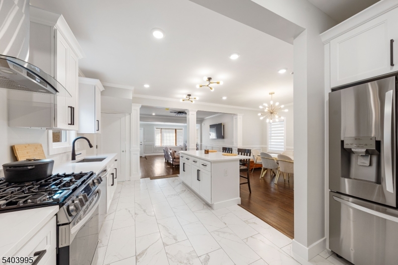 207 Post Avenue Lyndhurst, NJ 07071 - Photo 12 of 39 a large kitchen with stainless steel appliances granite countertop a stove a sink dishwasher and a refrigerator