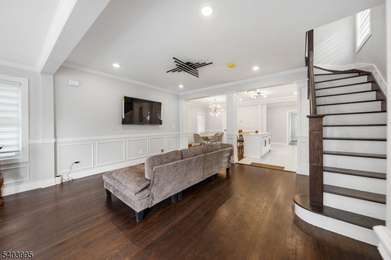 207 Post Avenue Lyndhurst, NJ 07071 - Photo 13 of 39 a living room with furniture and a flat screen tv