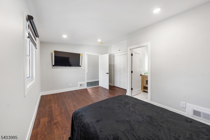 207 Post Avenue Lyndhurst, NJ 07071 - Photo 17 of 39 a view of a livingroom with a flat screen tv