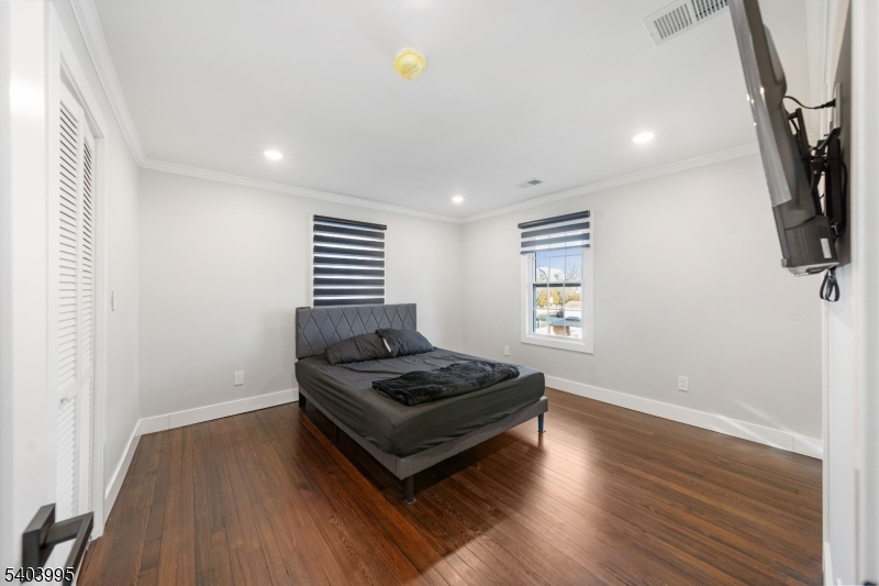 207 Post Avenue Lyndhurst, NJ 07071 - Photo 18 of 39 a living room with furniture and a flat screen tv