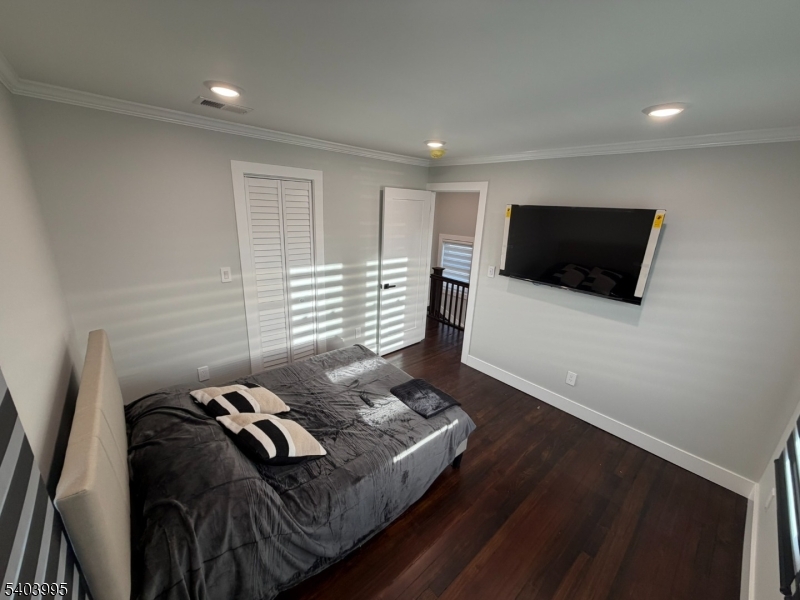 207 Post Avenue Lyndhurst, NJ 07071 - Photo 19 of 39 a living room with furniture and a flat screen tv