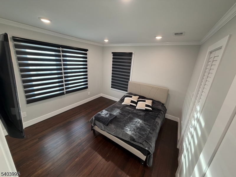 207 Post Avenue Lyndhurst, NJ 07071 - Photo 20 of 39 a room with wooden floor and furniture