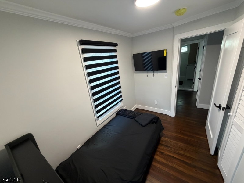 207 Post Avenue Lyndhurst, NJ 07071 - Photo 21 of 39 a view of a livingroom with wooden floor and stairs