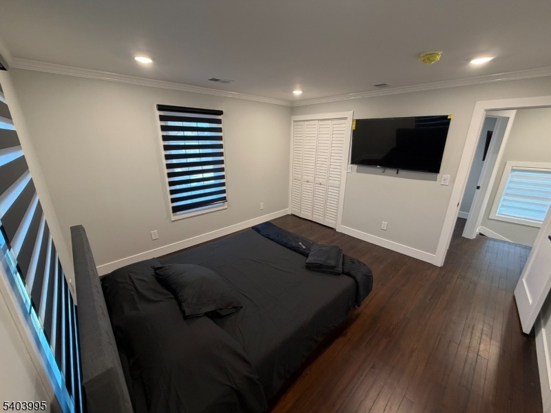 207 Post Avenue Lyndhurst, NJ 07071 - Photo 29 of 39 a living room with furniture and a flat screen tv