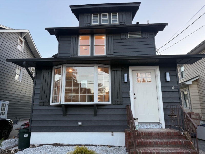 207 Post Avenue Lyndhurst, NJ 07071 - Photo 3 of 39 a front view of a house with a window