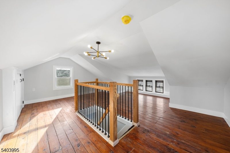 207 Post Avenue Lyndhurst, NJ 07071 - Photo 31 of 39 a view of a livingroom with wooden floor and a ceiling fan