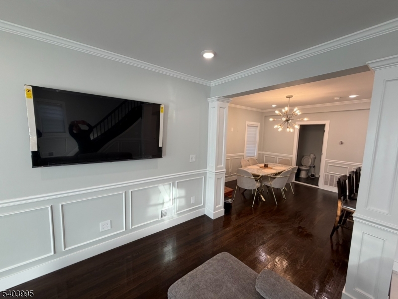 207 Post Avenue Lyndhurst, NJ 07071 - Photo 4 of 39 a living room with furniture and a flat screen tv