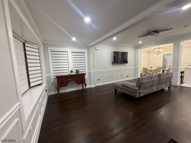 207 Post Avenue Lyndhurst, NJ 07071 - Photo 6 of 39 a living room with furniture and a flat screen tv