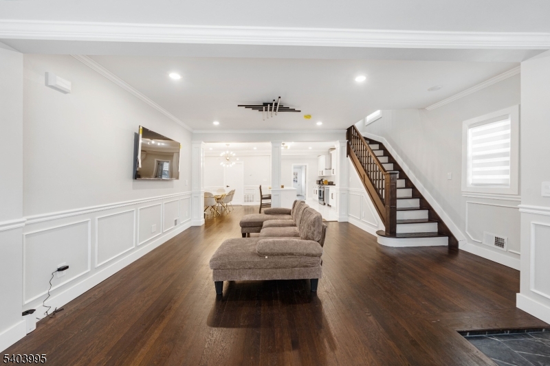 207 Post Avenue Lyndhurst, NJ 07071 - Photo 8 of 39 a living room with furniture and a flat screen tv