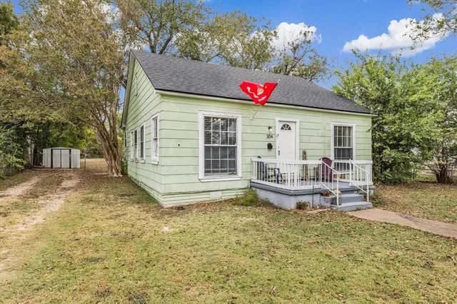 a front view of a house with porch