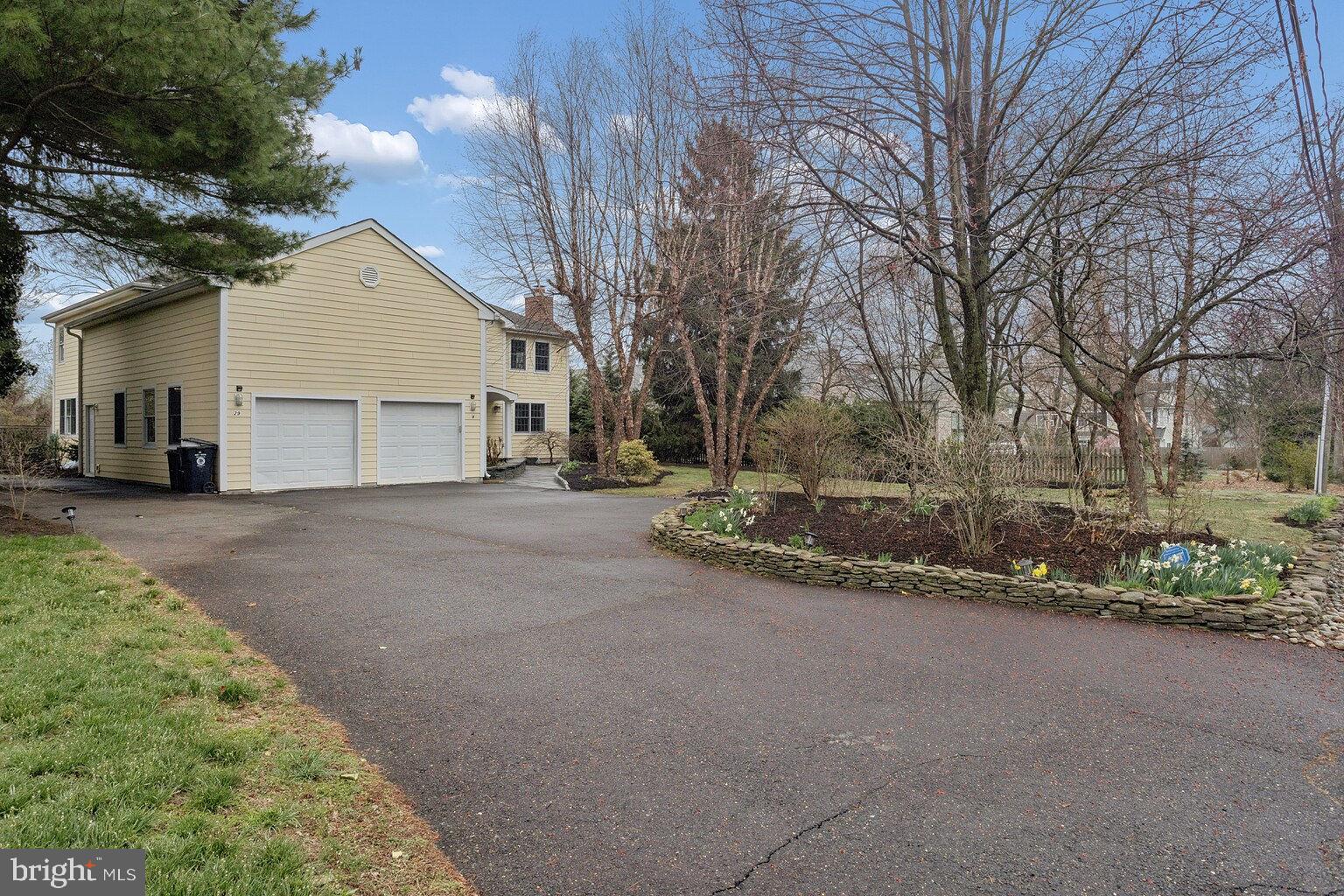 29 Dempsey Avenue Princeton, NJ 08540 - Photo 2 of 58 a view of a house with a yard and garage