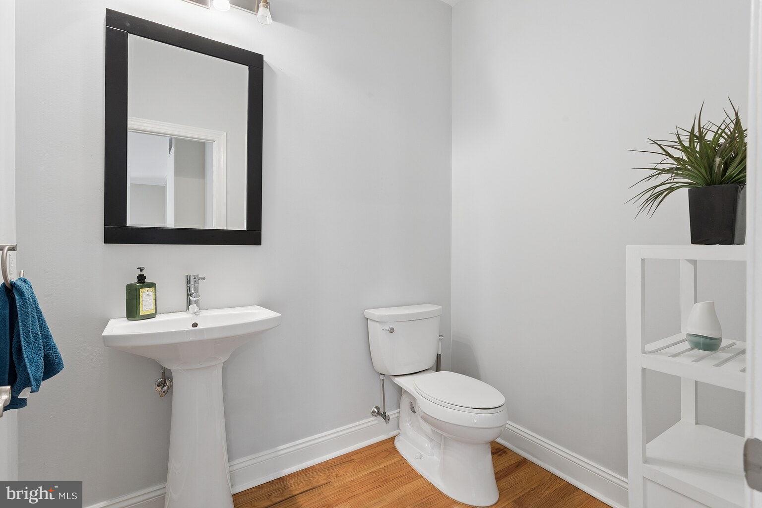 29 Dempsey Avenue Princeton, NJ 08540 - Photo 23 of 58 a bathroom with a toilet a sink and mirror