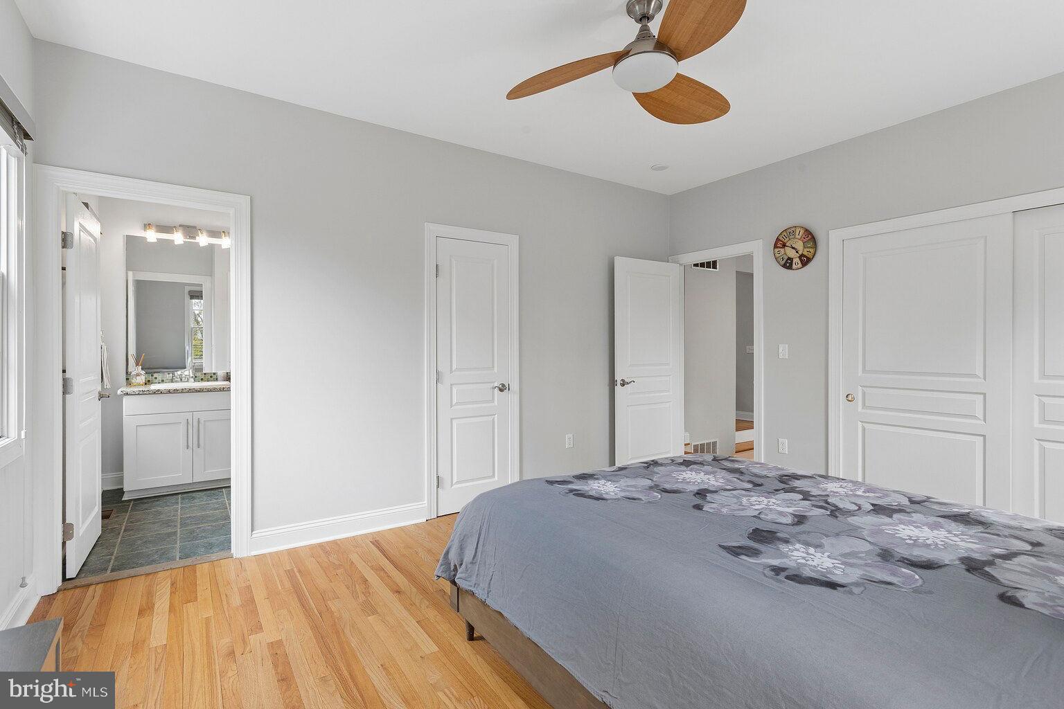 29 Dempsey Avenue Princeton, NJ 08540 - Photo 25 of 58 a bedroom with a bed and a mirror
