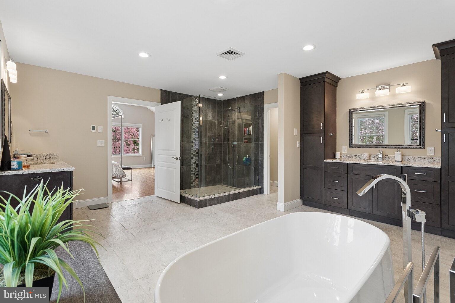 29 Dempsey Avenue Princeton, NJ 08540 - Photo 33 of 58 a spacious bathroom with a tub shower and sink