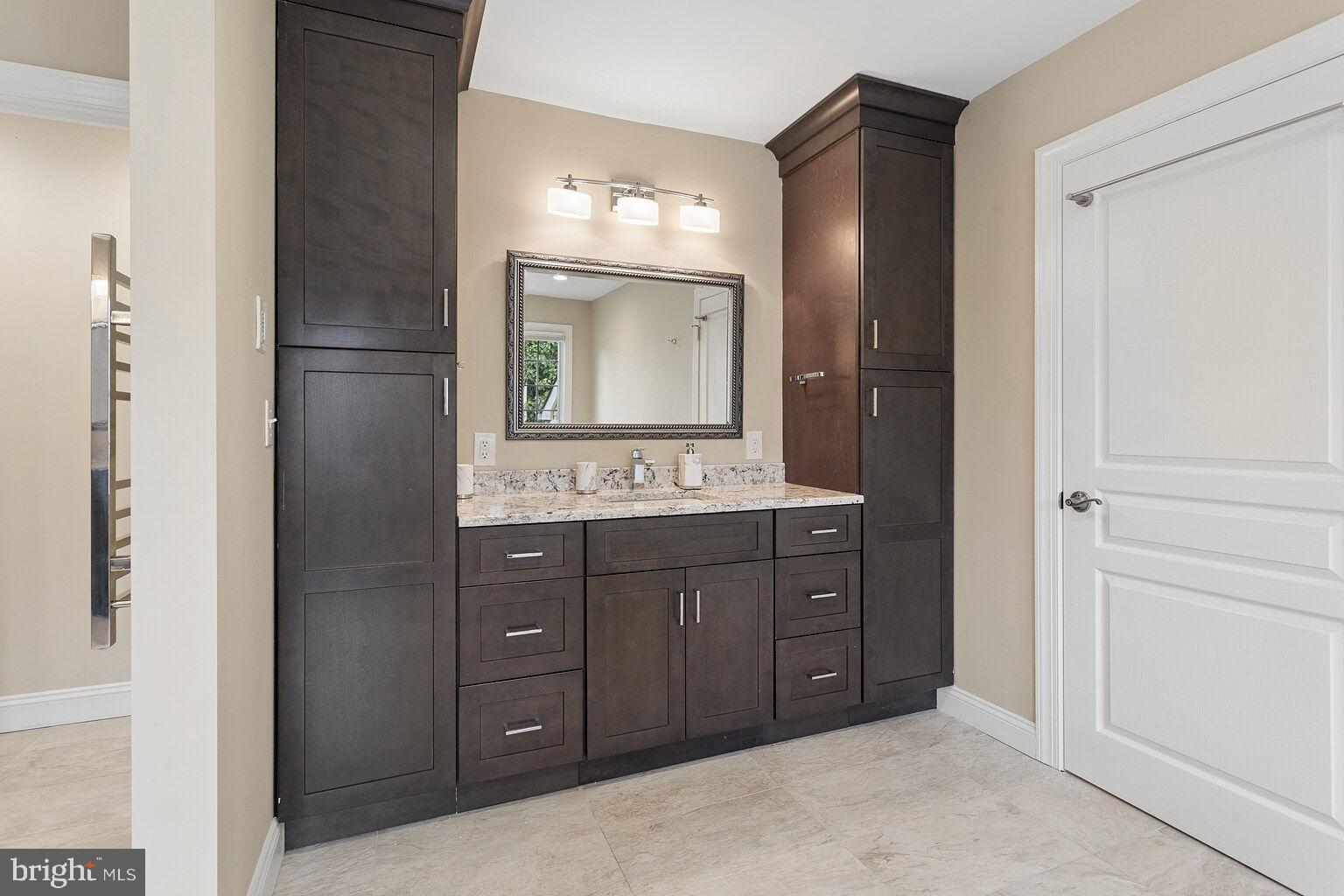 29 Dempsey Avenue Princeton, NJ 08540 - Photo 36 of 58 a bathroom with a double vanity sink and a mirror