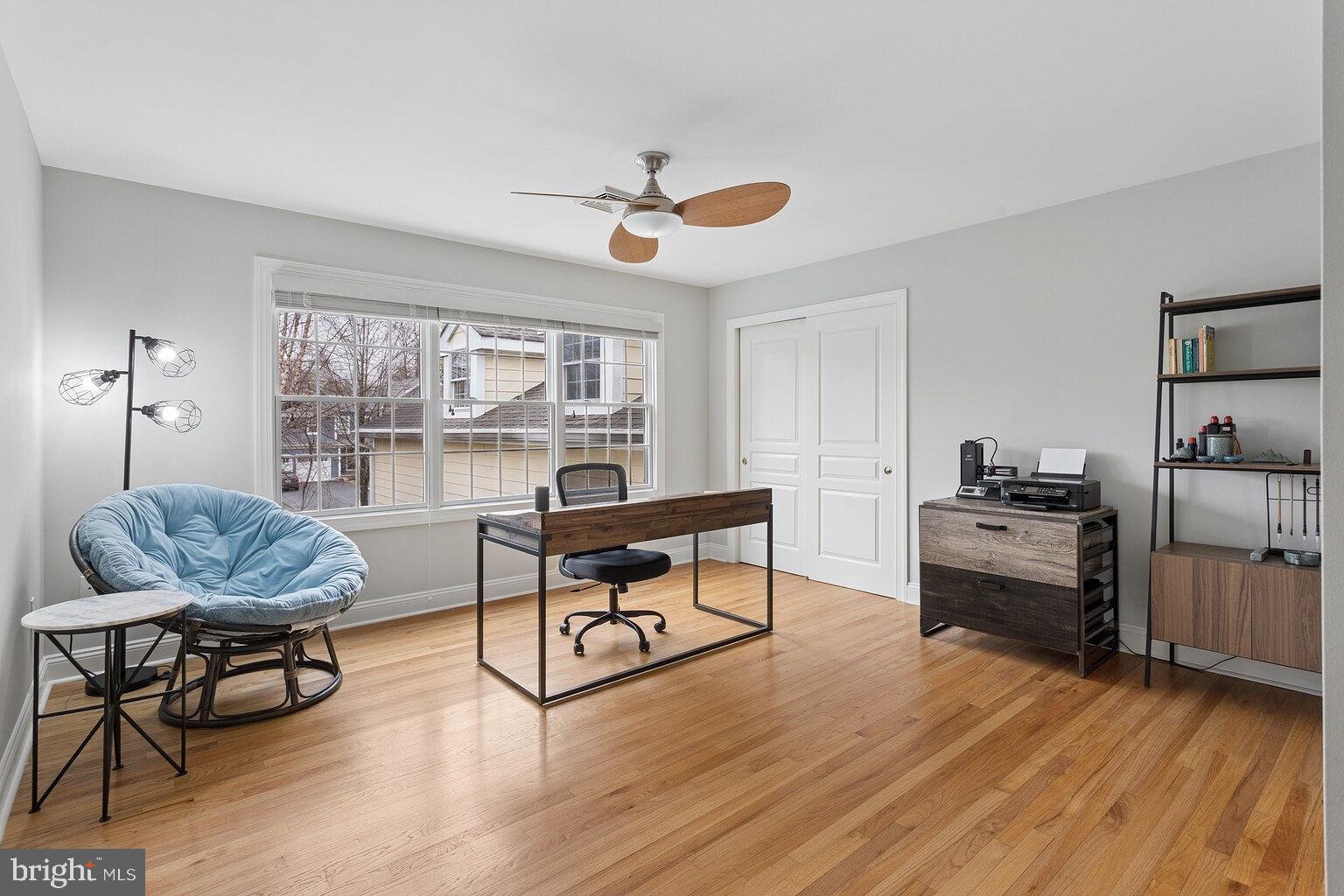 29 Dempsey Avenue Princeton, NJ 08540 - Photo 40 of 58 a living room with furniture and a wooden floor