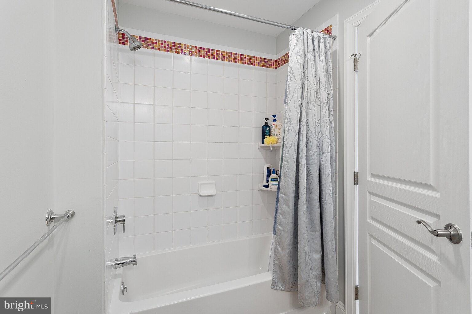 29 Dempsey Avenue Princeton, NJ 08540 - Photo 43 of 58 a bathroom with a shower and a tub