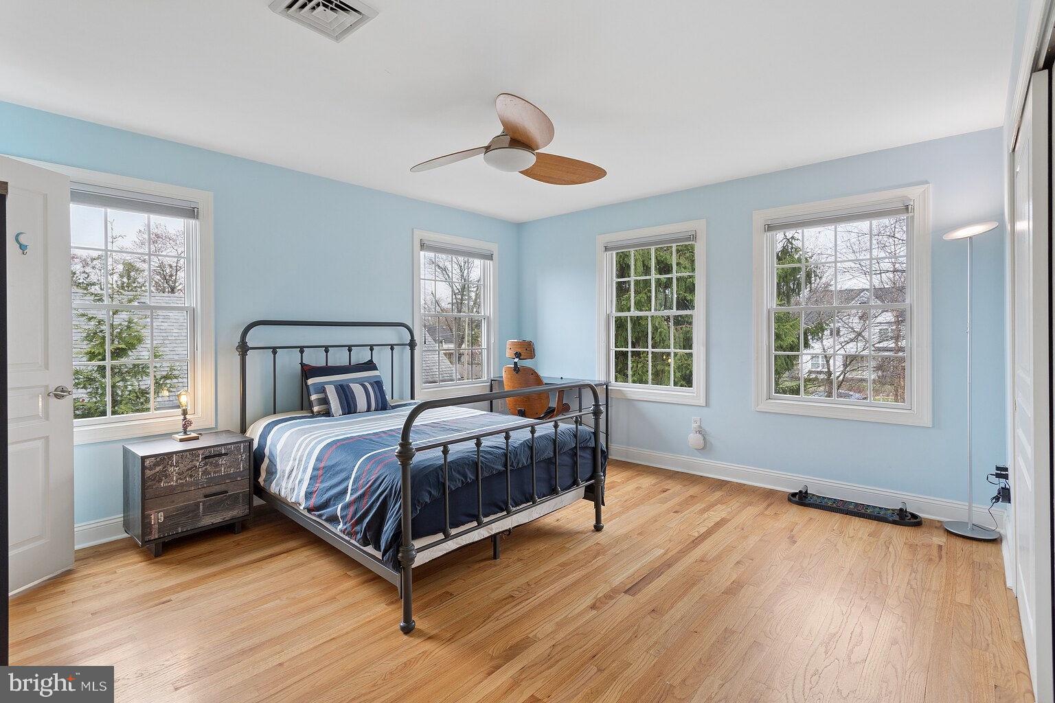 29 Dempsey Avenue Princeton, NJ 08540 - Photo 45 of 58 a bedroom with a bed lamp and a large window