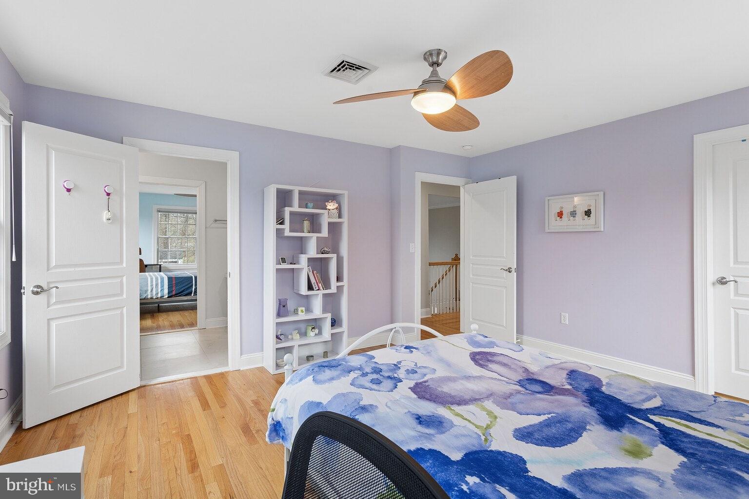 29 Dempsey Avenue Princeton, NJ 08540 - Photo 52 of 58 a bedroom with a bed and a chandelier