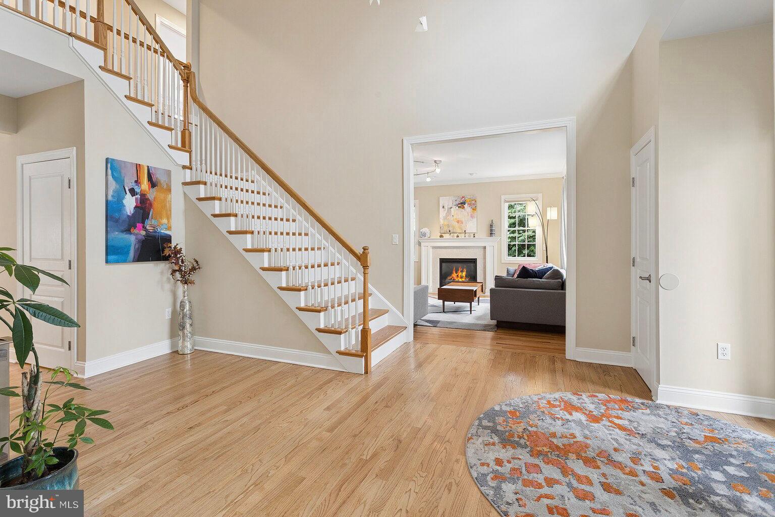 29 Dempsey Avenue Princeton, NJ 08540 - Photo 6 of 58 a view of a livingroom with wooden floor and staircase