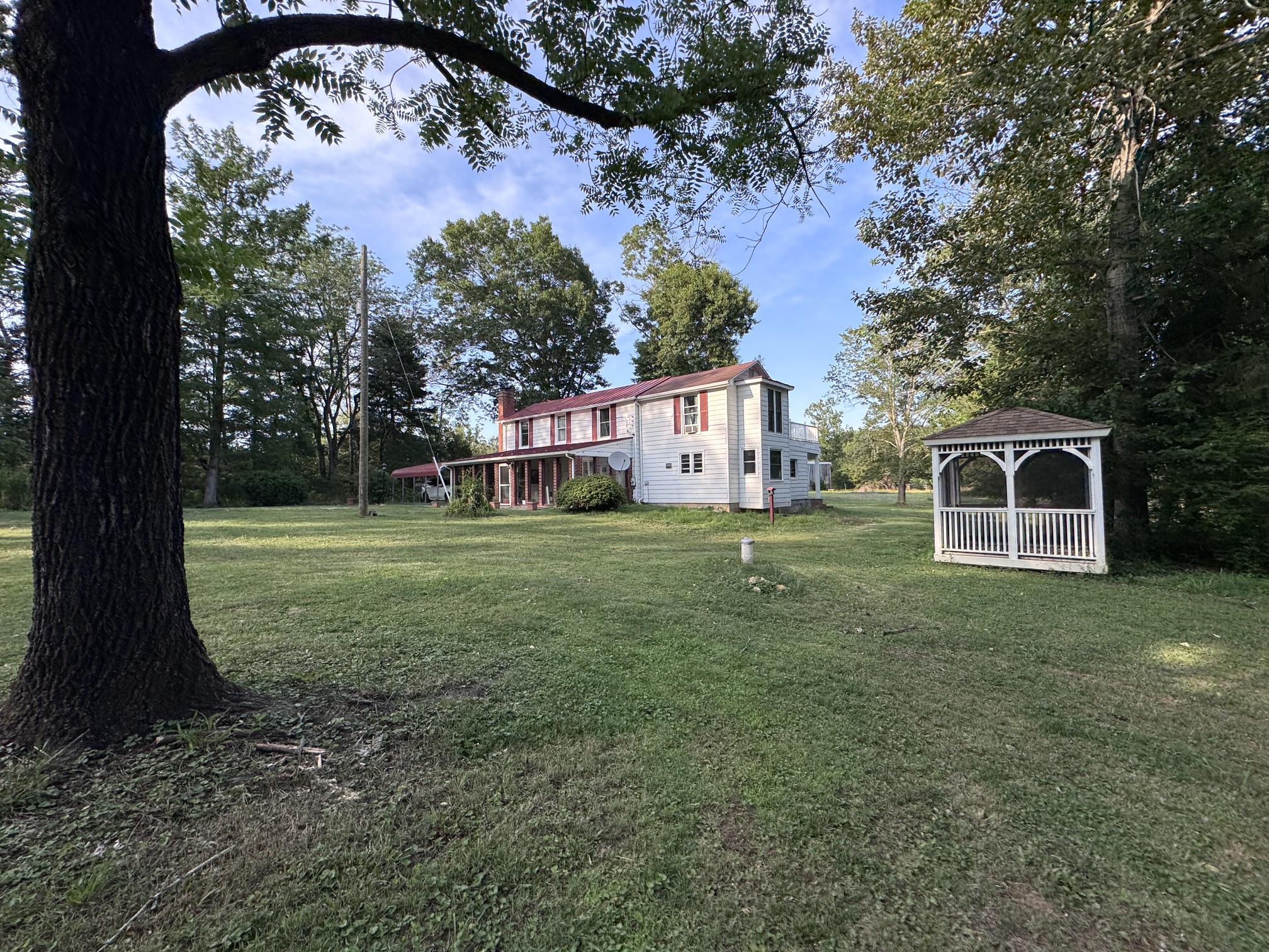 31934 Indiantown Road Locust Grove, VA 22508 - Photo 4 of 6 a view of a house with a yard