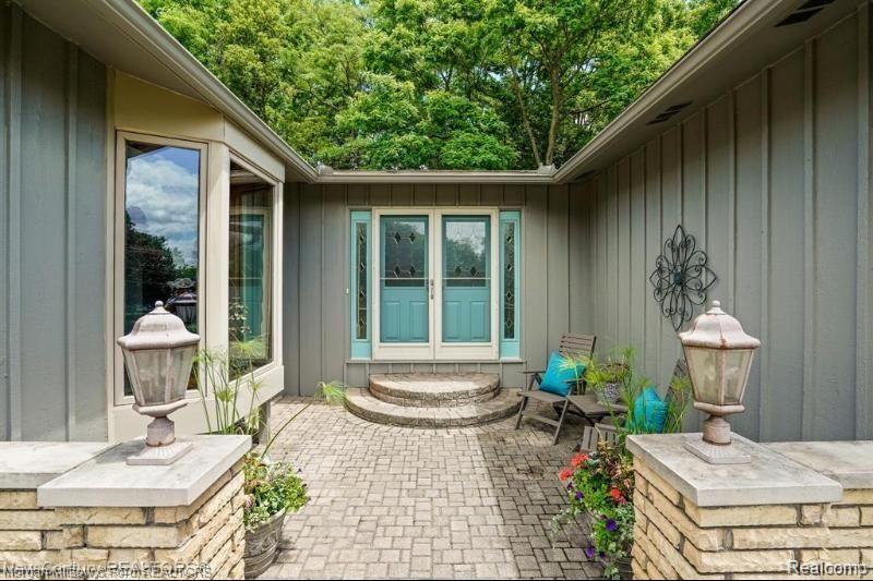 7936 Perry Lake Road Clarkston, MI 48348 - Photo 2 of 25 Welcoming approach accented by brick pavers