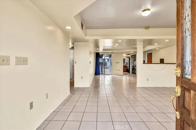 a view of a hallway with a furniture