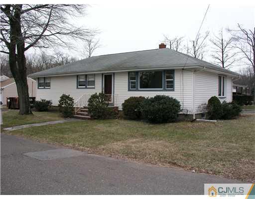 967 New Dover Road Edison, NJ 08820 - Photo 1 of 8 a front view of a house with garden