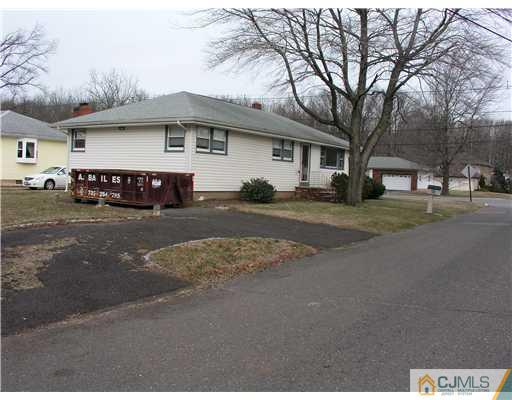 967 New Dover Road Edison, NJ 08820 - Photo 2 of 8 a view of a house with a yard and large tree