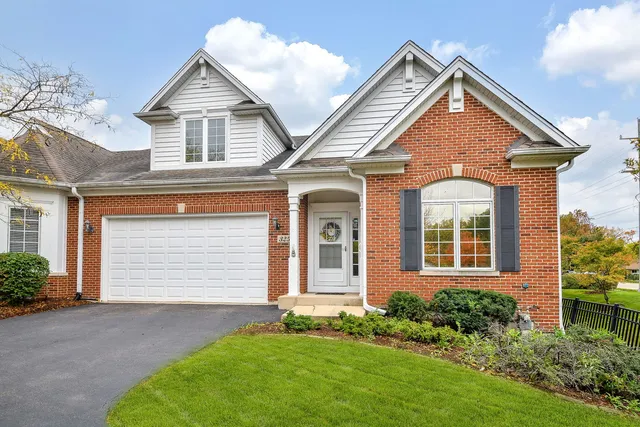 front view of a house and a yard