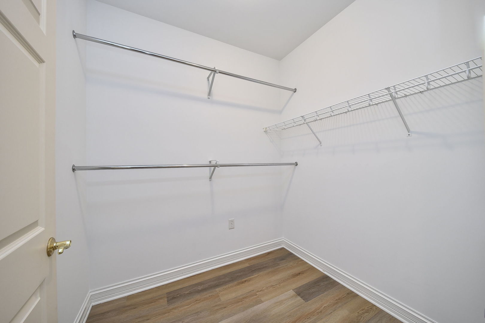 325 Delnor Glen Drive, Unit 325 St. Charles, IL 60174 - Photo 13 of 19 a view of a room with racks on the wall