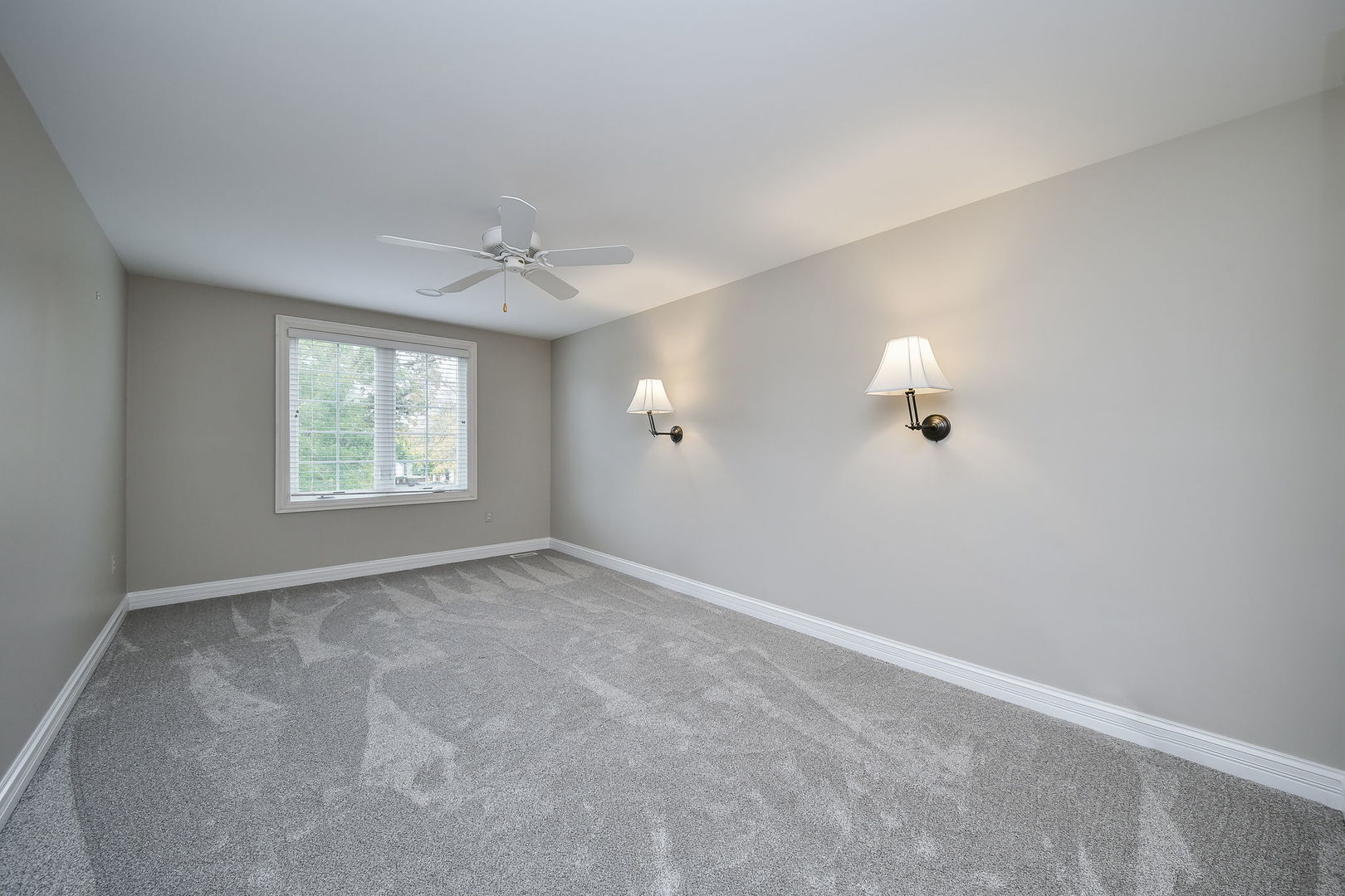 325 Delnor Glen Drive, Unit 325 St. Charles, IL 60174 - Photo 14 of 19 an empty room with windows and fan