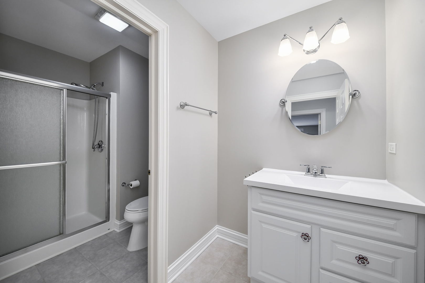 325 Delnor Glen Drive, Unit 325 St. Charles, IL 60174 - Photo 16 of 19 a bathroom with a sink toilet and shower