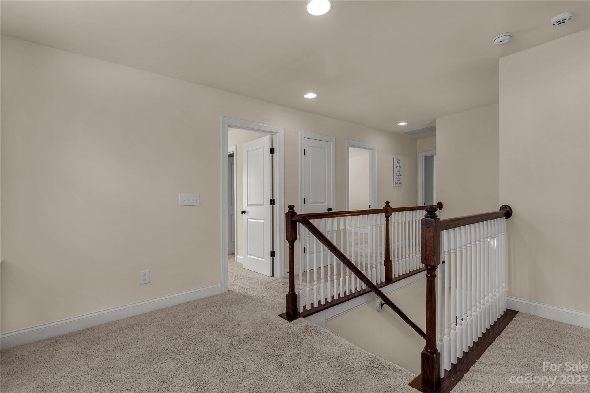 879 Pecan Tree Lane Fort Mill, SC 29715 - Photo 18 of 41 a view of a hallway with staircase