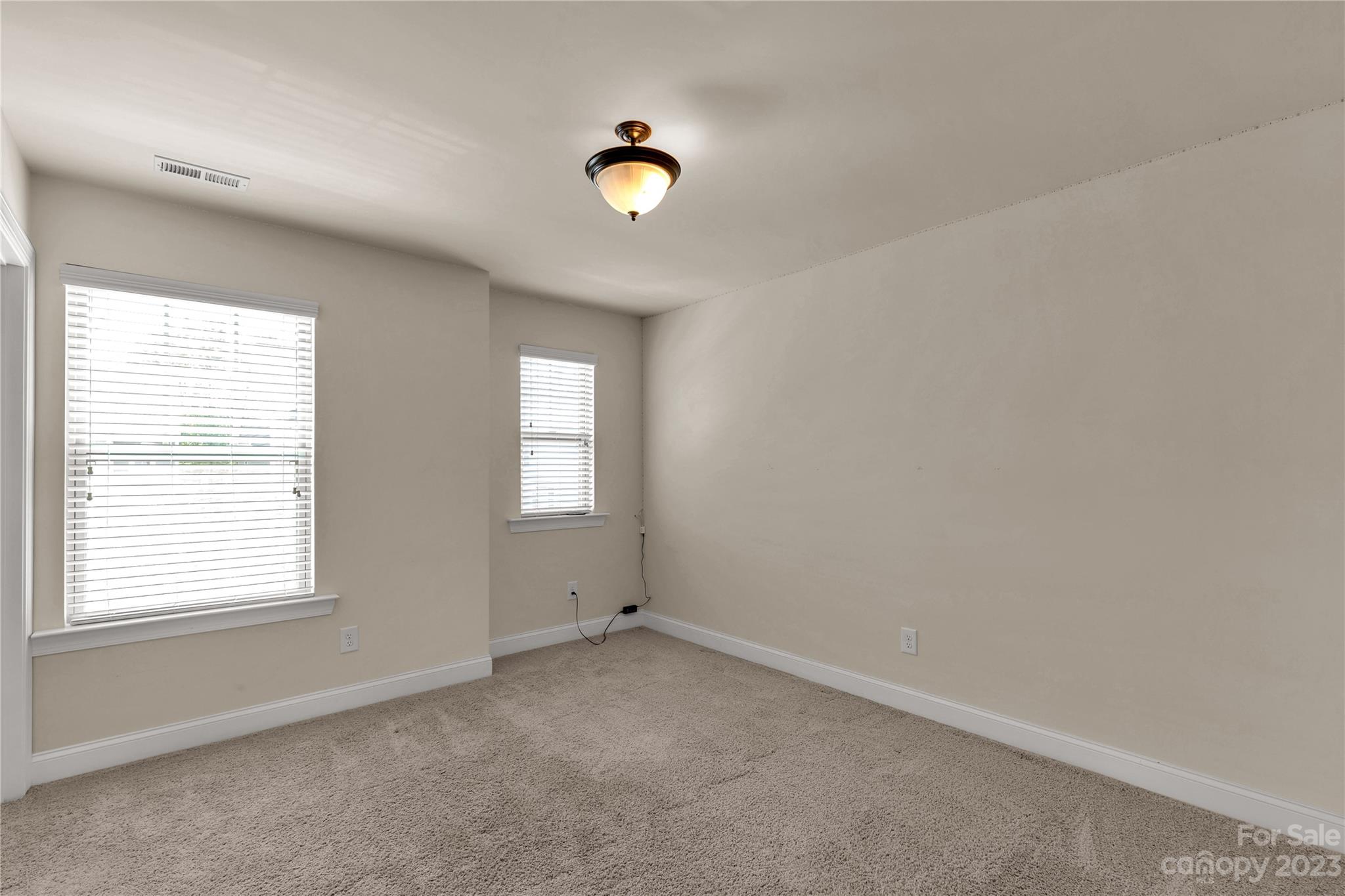 879 Pecan Tree Lane Fort Mill, SC 29715 - Photo 22 of 41 an empty room with a window