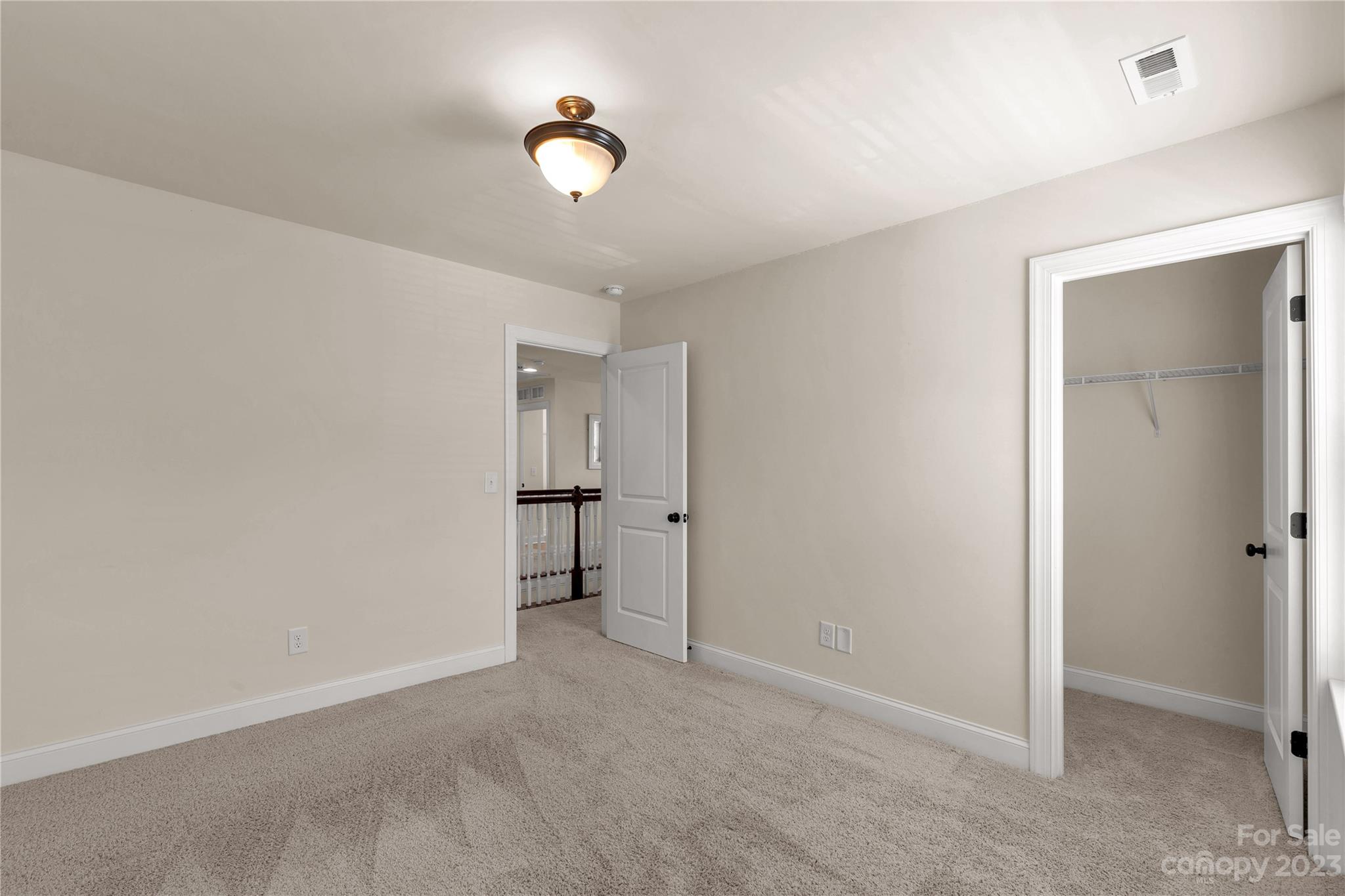 879 Pecan Tree Lane Fort Mill, SC 29715 - Photo 23 of 41 a view of a livingroom with wooden floor and a window