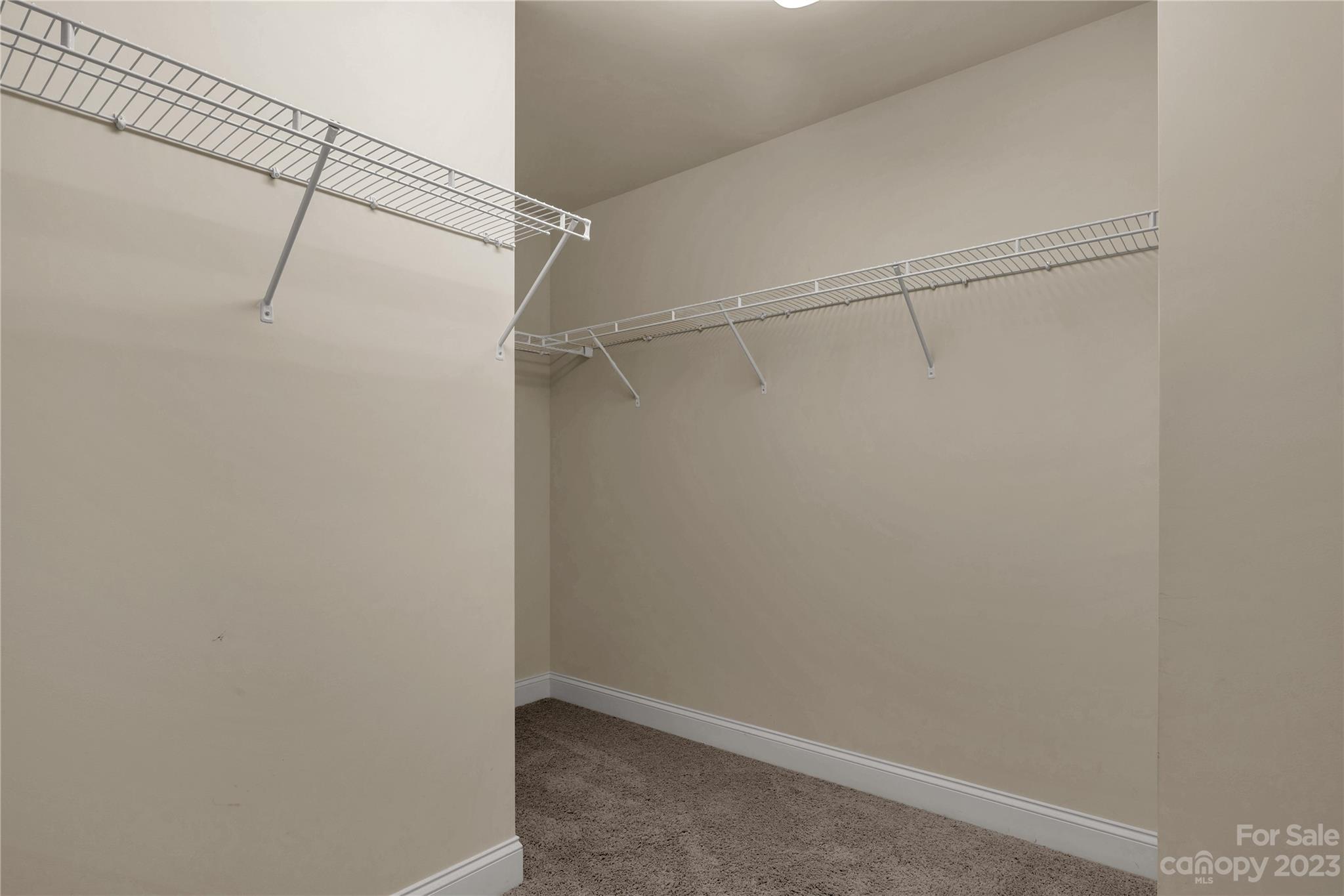 879 Pecan Tree Lane Fort Mill, SC 29715 - Photo 28 of 41 a view of a room with racks on the wall