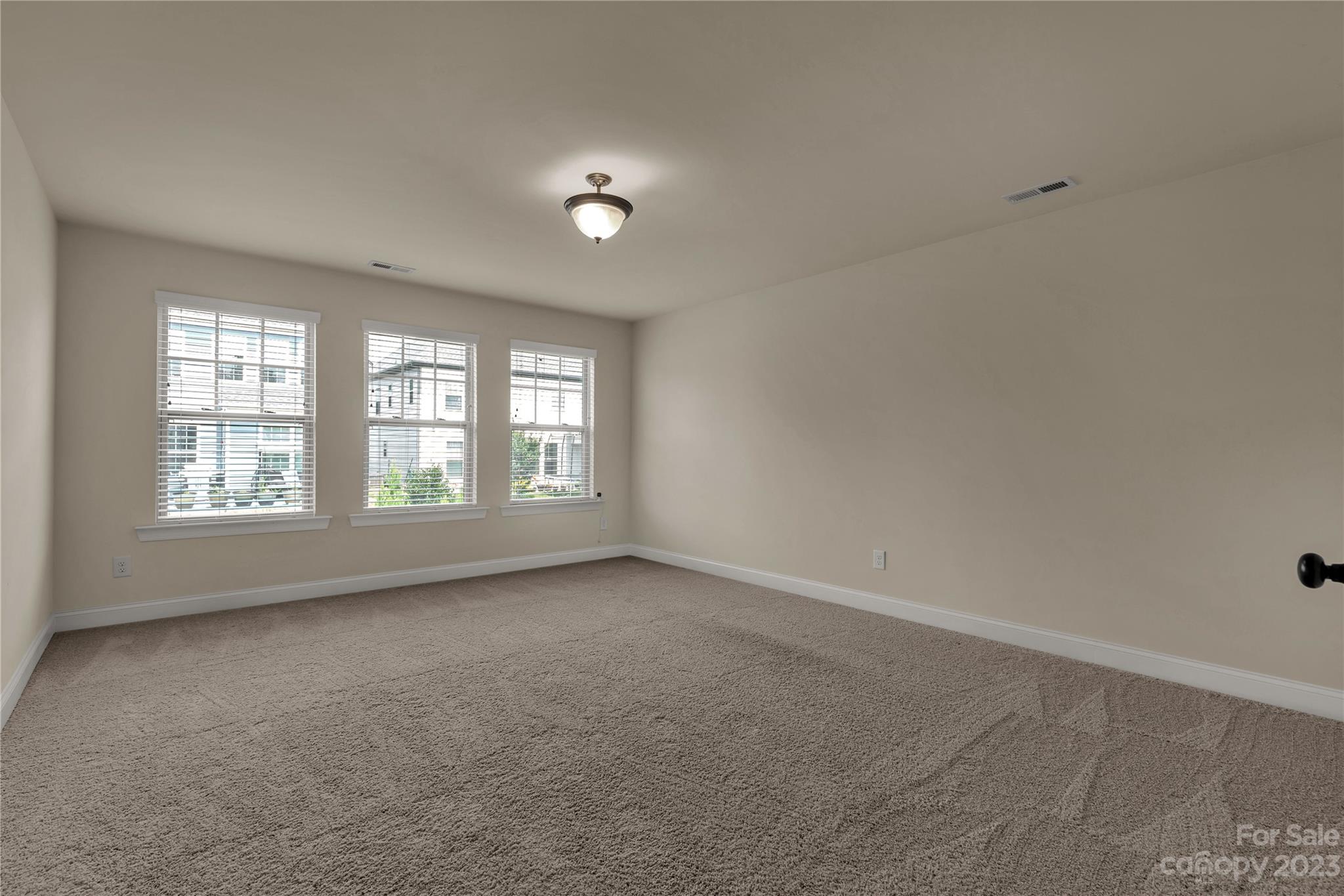 879 Pecan Tree Lane Fort Mill, SC 29715 - Photo 33 of 41 an empty room with windows