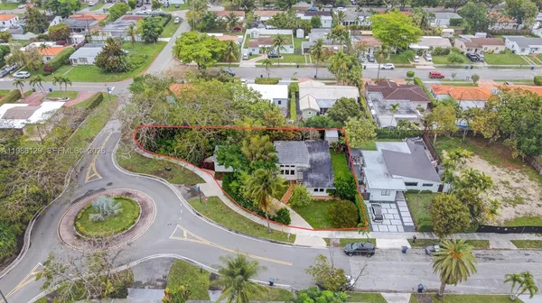 an aerial view of residential house with outdoor space